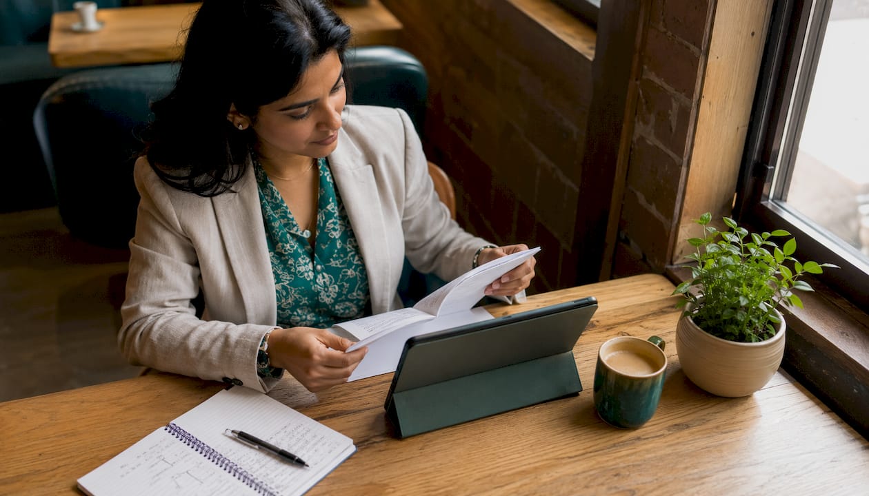 Professional woman coding Microsoft 365 automation