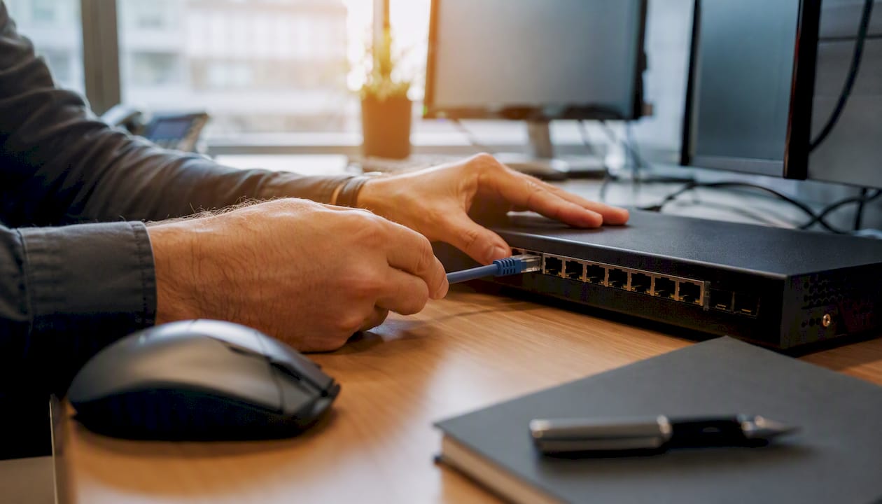 Hands configuring CRM network connection